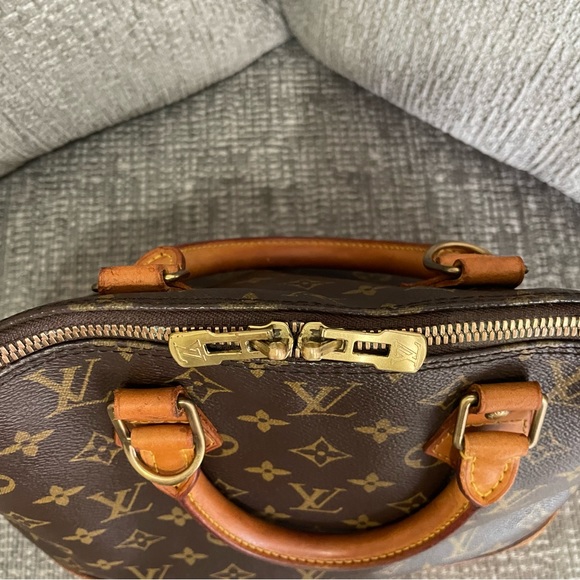 AUTHENTIC Monogram Alma PM Louis Vuitton bag authenticated by Authentic Street. - Picture 3 of 13